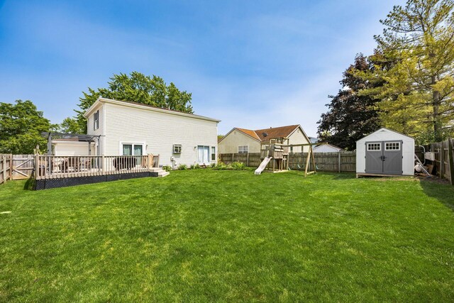5999 Waterview Dr, Hilliard, OH 43026 - view of yard with a playground and a wooden deck