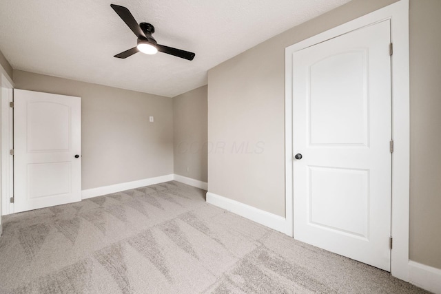 960 Carpenter St, Columbus, OH 43206 - empty room with light colored carpet, a ceiling fan, and baseboards