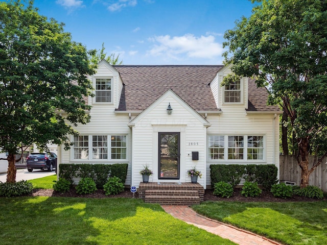 2805 Brandon Rd, Upper Arlington, OH 43221 - cape cod home featuring roof with shingles