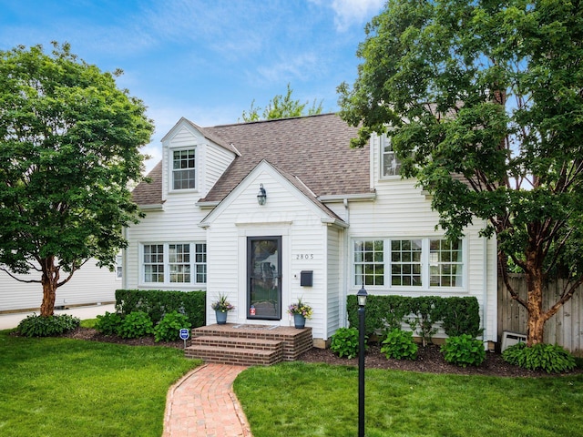 2805 Brandon Rd, Upper Arlington, OH 43221 - new england style home with roof with shingles