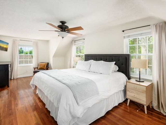 2805 Brandon Rd, Upper Arlington, OH 43221 - bedroom featuring wood finished floors, multiple windows, a ceiling fan, and a textured ceiling