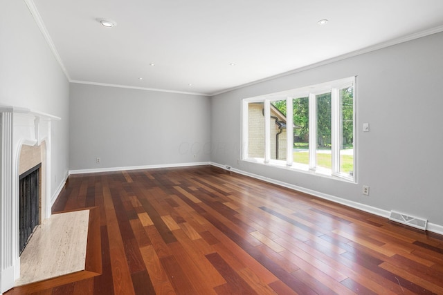 337 Naiche Ct, Columbus, OH 43213 - unfurnished living room featuring crown molding, wood-type flooring, a high end fireplace, and recessed lighting