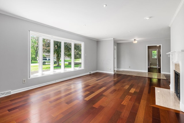 337 Naiche Ct, Columbus, OH 43213 - unfurnished living room with ornamental molding, hardwood / wood-style floors, a high end fireplace, and recessed lighting