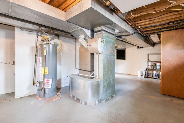 337 Naiche Ct, Columbus, OH 43213 - unfinished below grade area featuring gas water heater, heating unit, and concrete block wall