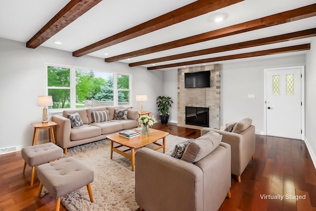 337 Naiche Ct, Columbus, OH 43213 - living area with beamed ceiling, dark wood-style floors, and a large fireplace
