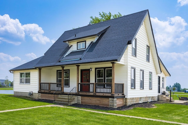 2174 Peachblow Rd, Lewis Center, OH 43035 - view of front of home featuring covered porch, a front lawn, and a shingled roof