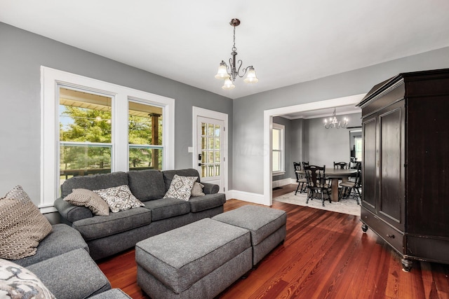 2174 Peachblow Rd, Lewis Center, OH 43035 - living area with a chandelier, dark wood finished floors, and baseboards