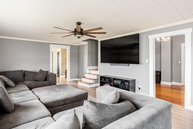 2174 Peachblow Rd, Lewis Center, OH 43035 - living room with crown molding, a ceiling fan, light wood finished floors, and baseboards