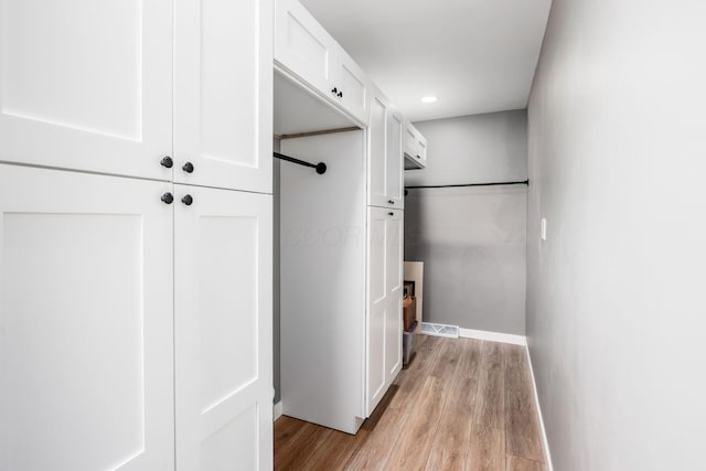 2174 Peachblow Rd, Lewis Center, OH 43035 - corridor featuring light wood-style flooring, recessed lighting, and baseboards