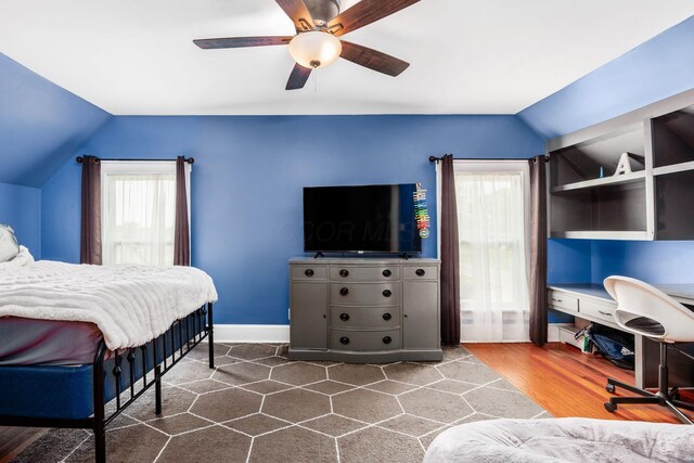 2174 Peachblow Rd, Lewis Center, OH 43035 - bedroom featuring lofted ceiling, a ceiling fan, dark wood-style floors, and baseboards