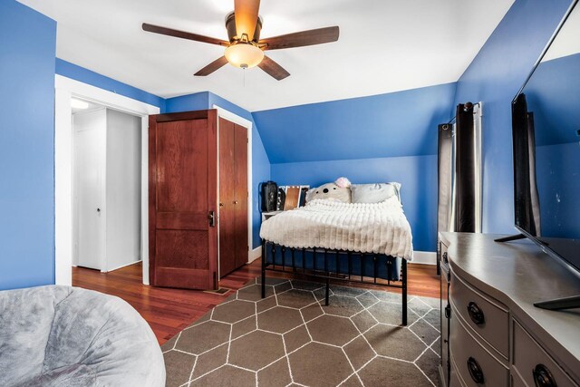 2174 Peachblow Rd, Lewis Center, OH 43035 - bedroom featuring dark wood finished floors, a ceiling fan, and lofted ceiling