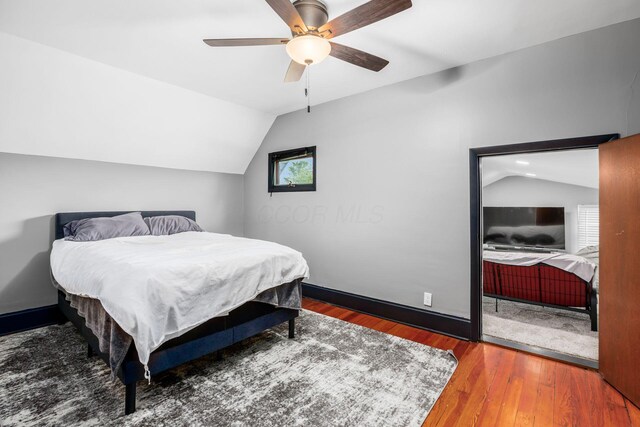 2174 Peachblow Rd, Lewis Center, OH 43035 - bedroom featuring vaulted ceiling, wood finished floors, ceiling fan, and baseboards
