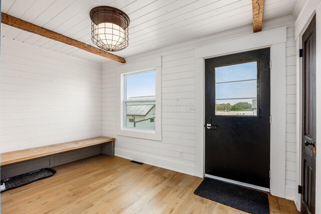 2174 Peachblow Rd, Lewis Center, OH 43035 - entryway with wooden ceiling with exposed beams, light wood finished floors, and wood walls