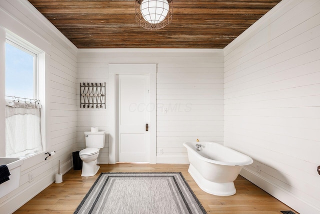 2174 Peachblow Rd, Lewis Center, OH 43035 - bathroom with wood ceiling, toilet, wood walls, wood finished floors, and a bidet