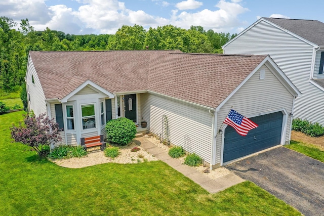 5191 Upland Meadow Dr, Canal Winchester, OH 43110 - view of front facade featuring an attached garage, a shingled roof, driveway, and a front yard