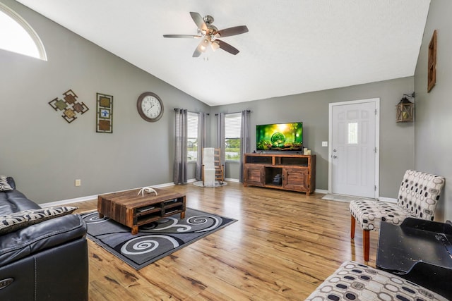 5191 Upland Meadow Dr, Canal Winchester, OH 43110 - living area featuring ceiling fan, wood finished floors, lofted ceiling, and baseboards