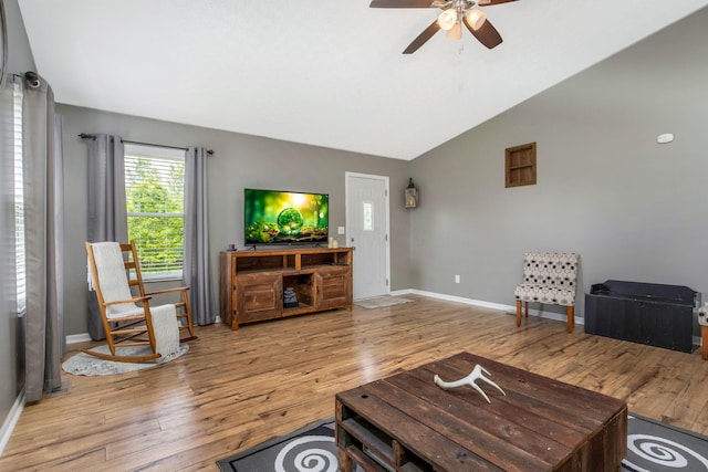 5191 Upland Meadow Dr, Canal Winchester, OH 43110 - living area featuring a ceiling fan, lofted ceiling, wood finished floors, and baseboards