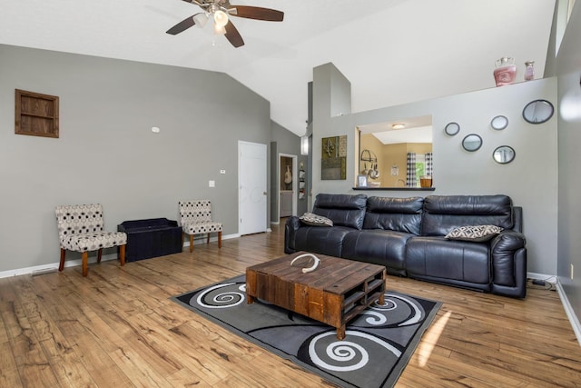 5191 Upland Meadow Dr, Canal Winchester, OH 43110 - living room featuring a ceiling fan, wood finished floors, high vaulted ceiling, and baseboards