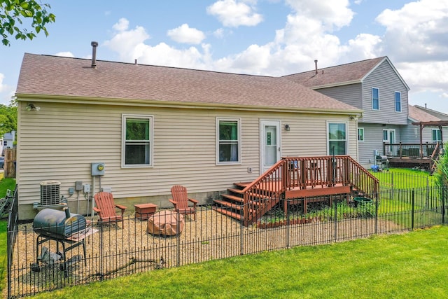 5191 Upland Meadow Dr, Canal Winchester, OH 43110 - back of property featuring an outdoor fire pit, a deck, a patio, and central air condition unit