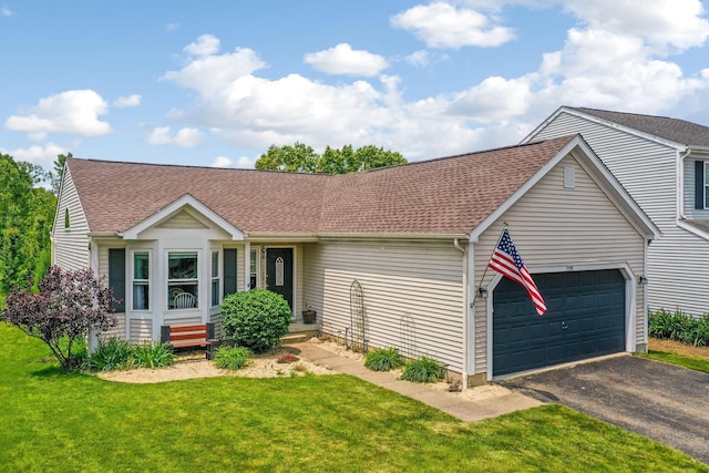 5191 Upland Meadow Dr, Canal Winchester, OH 43110 - ranch-style home featuring a garage, driveway, roof with shingles, and a front yard