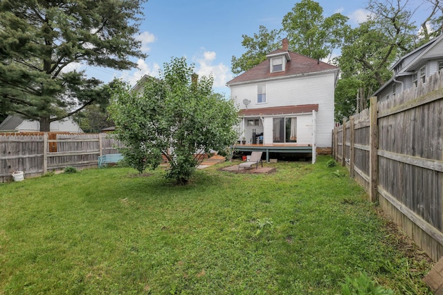 132 Orange St, Galion, OH 44833 - rear view of property with a deck and a chimney