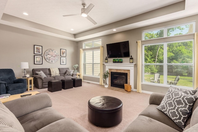 340 Olentangy W, Delaware, OH 43015 - living room featuring carpet floors, ceiling fan, a fireplace with flush hearth, healthy amount of natural light, and recessed lighting