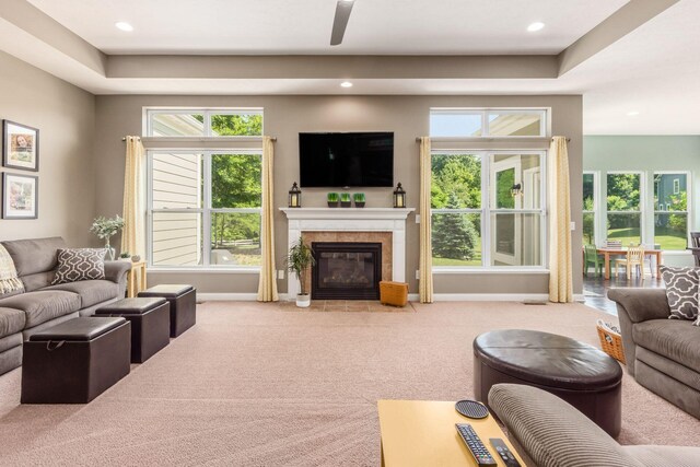 340 Olentangy W, Delaware, OH 43015 - living room featuring ceiling fan, carpet flooring, a tile fireplace, recessed lighting, and healthy amount of natural light
