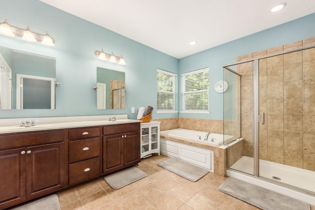 340 Olentangy W, Delaware, OH 43015 - bathroom featuring a stall shower, a bath, double vanity, tile patterned floors, and recessed lighting
