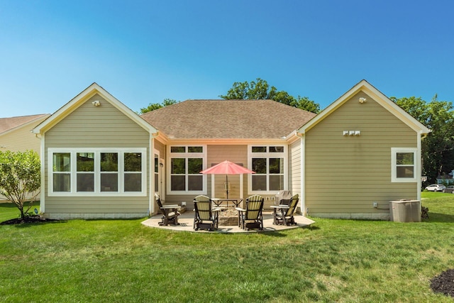 340 Olentangy W, Delaware, OH 43015 - back of house featuring a patio area, a lawn, central air condition unit, and roof with shingles