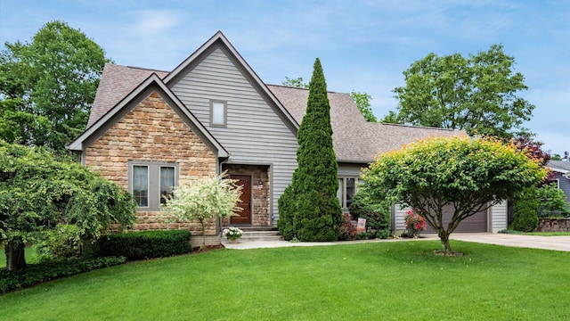 102 Sequoia Dr, Byesville, OH 43723 - view of front of property with stone siding, driveway, roof with shingles, and a front yard