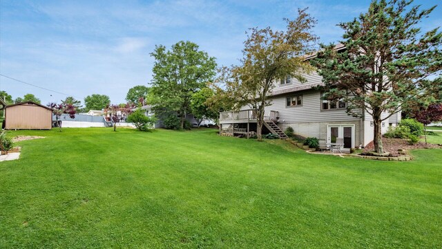 102 Sequoia Dr, Byesville, OH 43723 - view of grassy yard with a wooden deck, french doors, and stairs