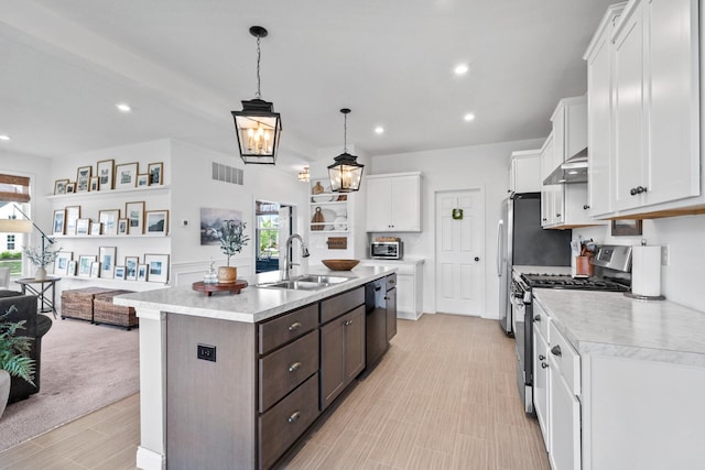 8318 Fig Grove Way, Plain City, OH 43064 - kitchen featuring appliances with stainless steel finishes, a sink, light countertops, healthy amount of natural light, and recessed lighting