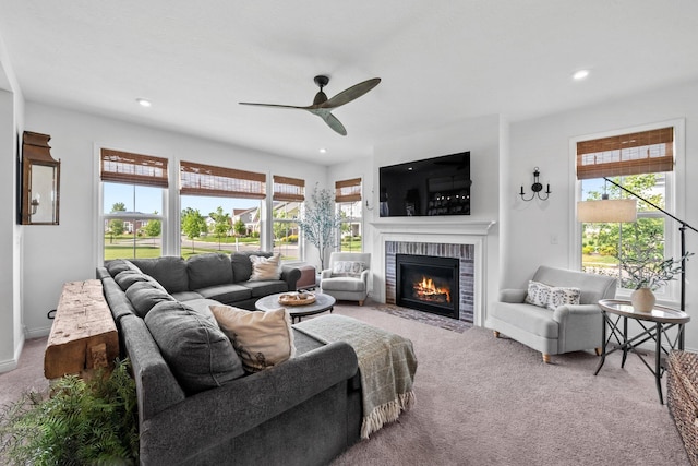 8318 Fig Grove Way, Plain City, OH 43064 - carpeted living area featuring a ceiling fan, a brick fireplace, and recessed lighting
