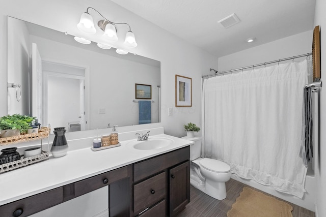 8318 Fig Grove Way, Plain City, OH 43064 - bathroom with vanity, toilet, shower / bath combination with curtain, and wood finished floors