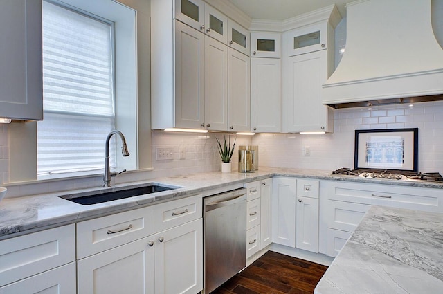 717 S 3rd St, Columbus, OH 43206 - kitchen featuring appliances with stainless steel finishes, custom exhaust hood, white cabinets, backsplash, and glass insert cabinets