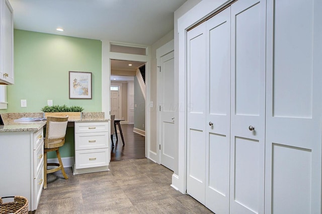 717 S 3rd St, Columbus, OH 43206 - home office with light wood-style floors, recessed lighting, and built in study area