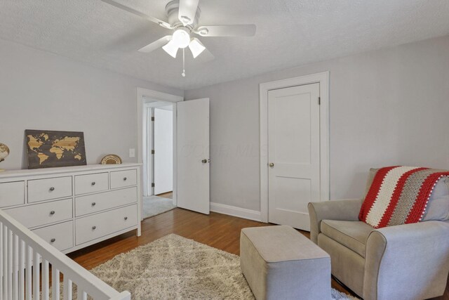 1442 S 4th St, Columbus, OH 43207 - bedroom featuring wood finished floors, ceiling fan, and baseboards