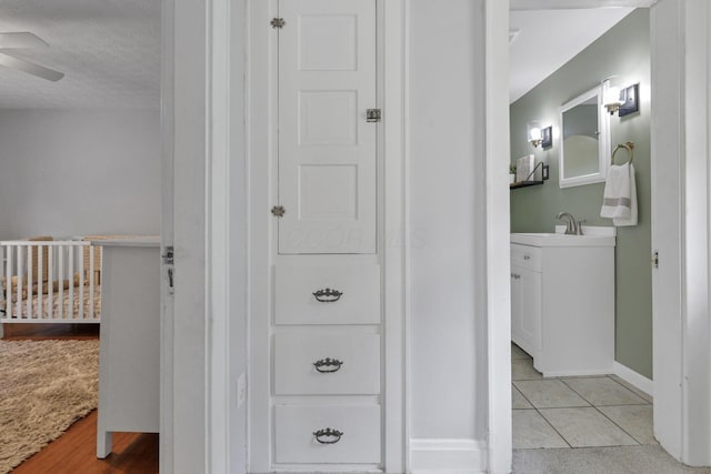 1442 S 4th St, Columbus, OH 43207 - hallway with baseboards and light tile patterned flooring