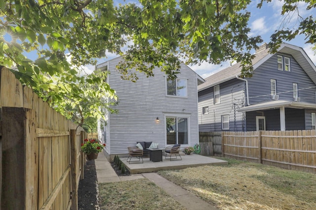 1442 S 4th St, Columbus, OH 43207 - rear view of property featuring a patio area and a fenced backyard