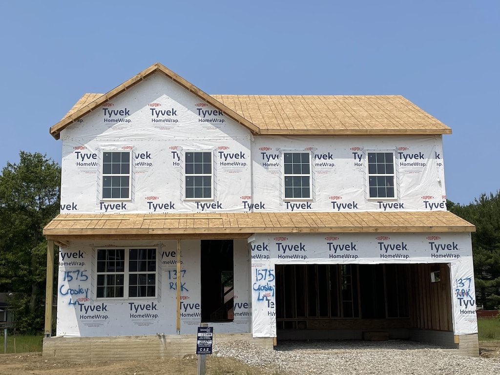 1575 Crosley Ln, Columbus, OH 43228 - property in mid-construction featuring an attached garage