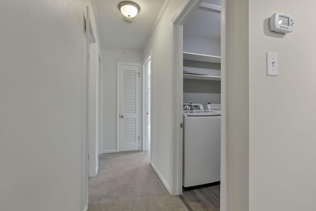 1631 Roxbury Rd Unit B6, Columbus, OH 43212 - hallway with washing machine and clothes dryer, baseboards, and ornamental molding