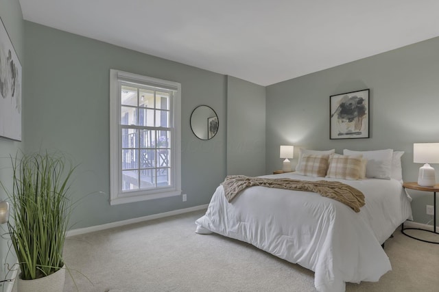 1631 Roxbury Rd Unit B6, Columbus, OH 43212 - carpeted bedroom featuring multiple windows and baseboards