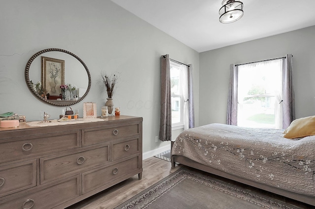 244 Shepper Ave, Plain City, OH 43064 - bedroom featuring light wood-style flooring and baseboards