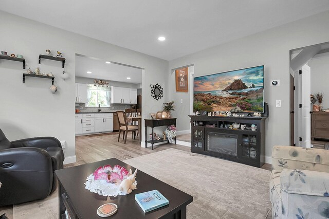 244 Shepper Ave, Plain City, OH 43064 - living room with light wood-style flooring, recessed lighting, and baseboards