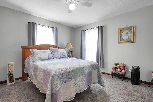 244 Shepper Ave, Plain City, OH 43064 - carpeted bedroom with baseboards and ceiling fan