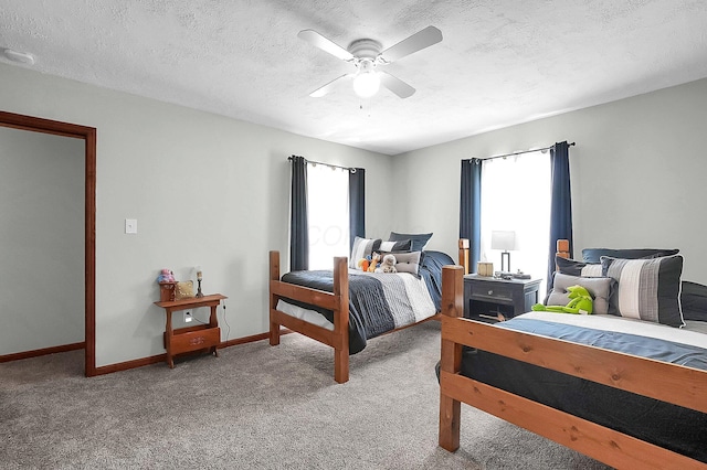 244 Shepper Ave, Plain City, OH 43064 - bedroom with multiple windows, light colored carpet, baseboards, a textured ceiling, and a ceiling fan