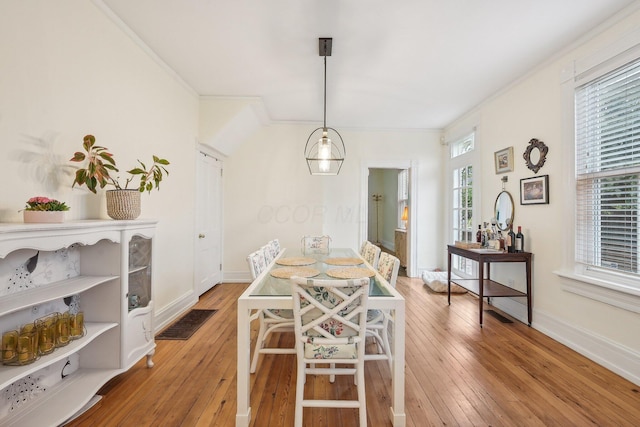 436 Beck St, Columbus, OH 43206 - dining room with hardwood / wood-style flooring, ornamental molding, and baseboards