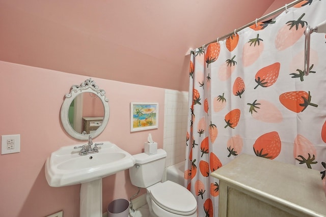 436 Beck St, Columbus, OH 43206 - bathroom featuring toilet and shower / bath combination with curtain