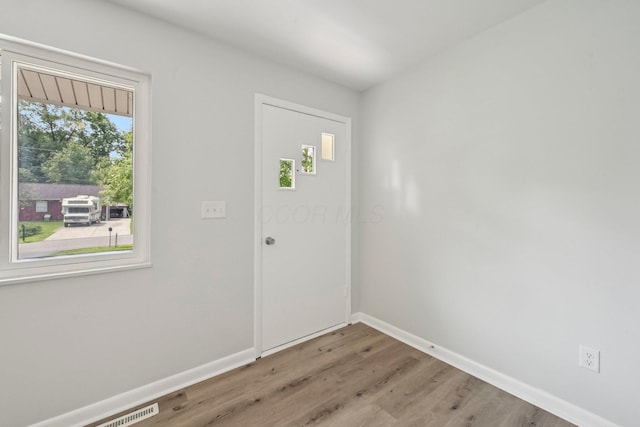 106 Woodrow Ave, Delaware, OH 43015 - foyer featuring baseboards and wood finished floors