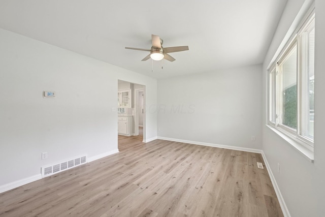 106 Woodrow Ave, Delaware, OH 43015 - empty room with ceiling fan, light wood-style floors, and baseboards